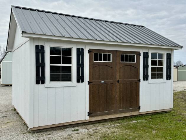 16'' OC 2X6 FLOOR JOISTS






6'7'' SIDEWALL HEIGHT






6' DOUBLE CARRIAGE DOORS






2-2X3 SINGLE PANE WINDOWS






2- PR. WOODEN SHUTTERS






8'' OVERHANG ON ALL SIDES, 7/12 ROOF PITCH






4' LOFT AREA ON EACH END