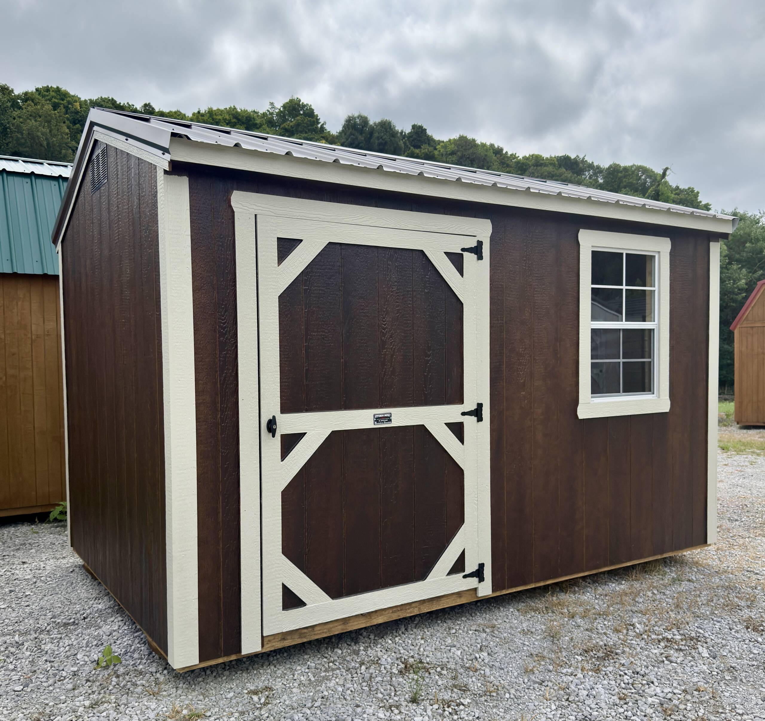 16'' OC FLOOR JOISTS
6'7'' SIDEWALL HEIGHT
6' DOUBLE SHED DOORS (4' SHED DOOR ON 8' WIDE)
1-2X3 SINGLE PANE WINDOW
4' LOFT AREA