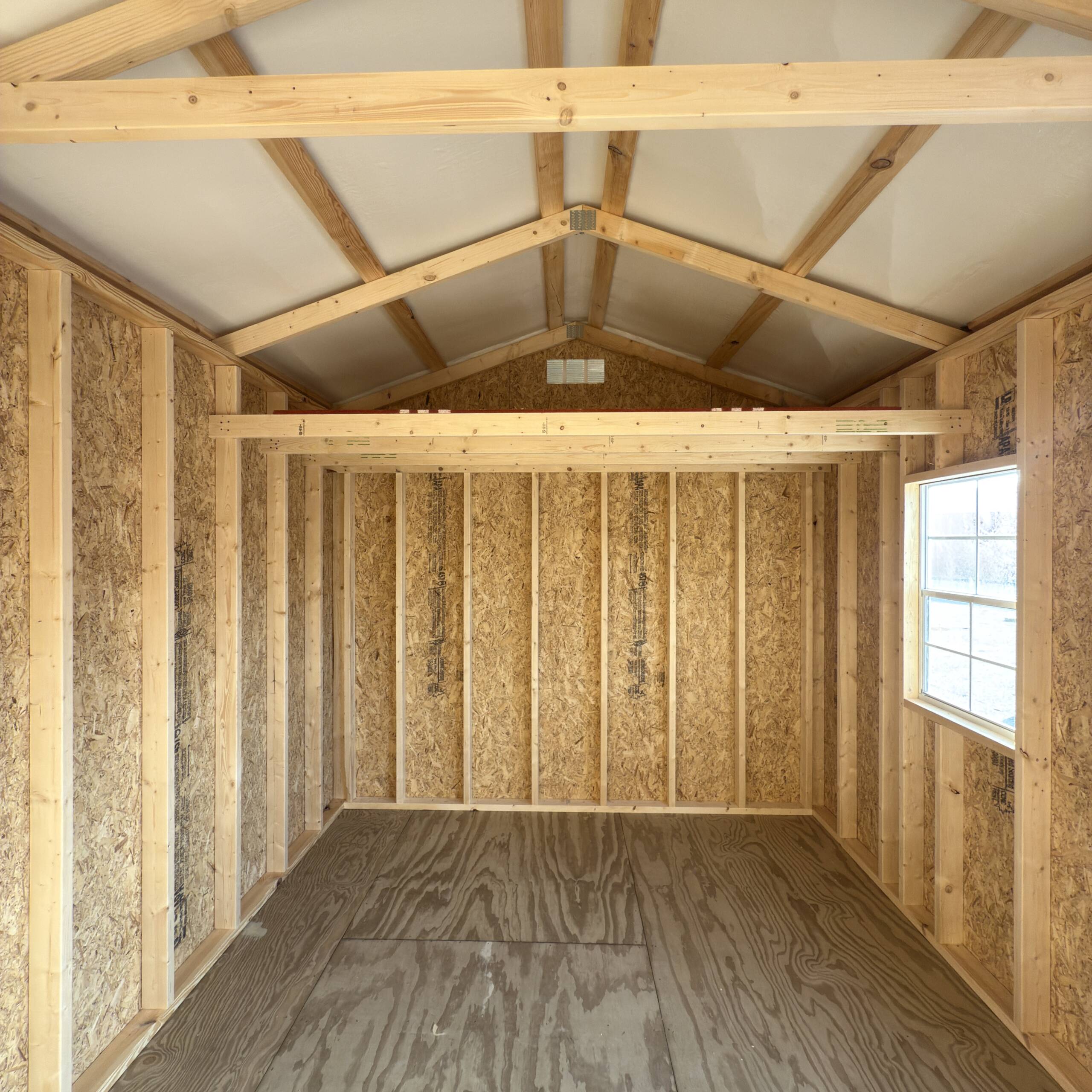 16'' OC FLOOR JOISTS
7'9'' SIDEWALL HEIGHT
6' DOUBLE SHED DOORS W/ TRANSOM WINDOWS
1-2X3 SINGLE PANE WINDOW
4' LOFT AREA - Image 6