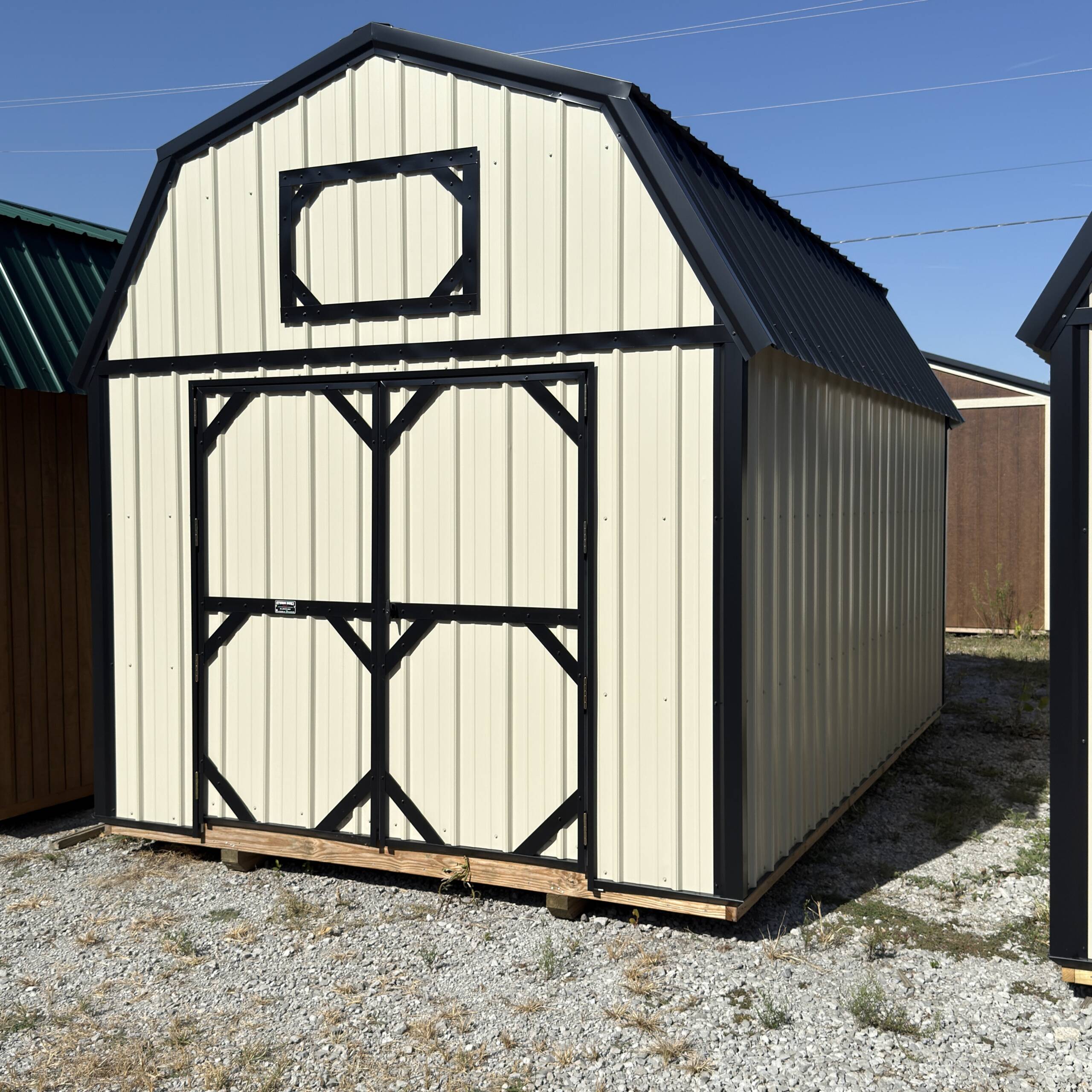 16'' OC FLOOR JOISTS
6'7'' SIDEWALL HEIGHT
6' DOUBLE SHED DOORS (4' SHED DOOR ON 8' WIDE)
FULL LENGTH LOFT SPACE WITH 4' CENTER OPENING - Image 3