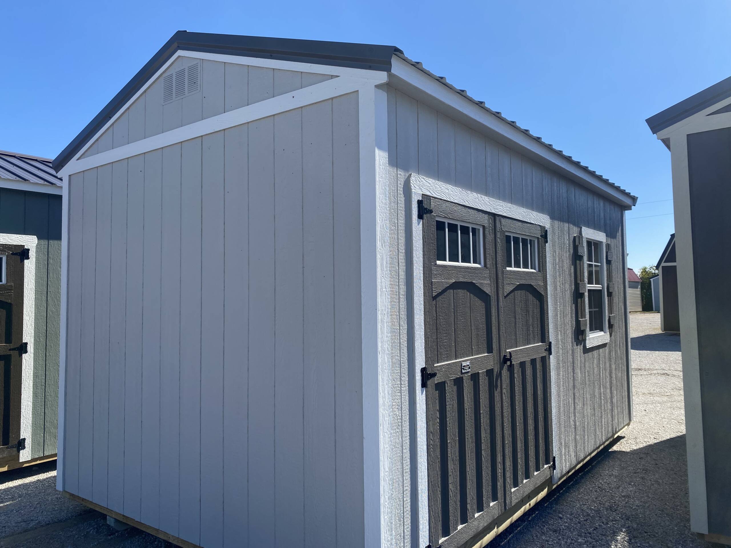 16'' OC FLOOR JOISTS
7'9'' SIDEWALL HEIGHT
6' DOUBLE SHED DOORS W/ TRANSOM WINDOWS
1-2X3 SINGLE PANE WINDOW W/ SHUTTERS
4' LOFT AREA