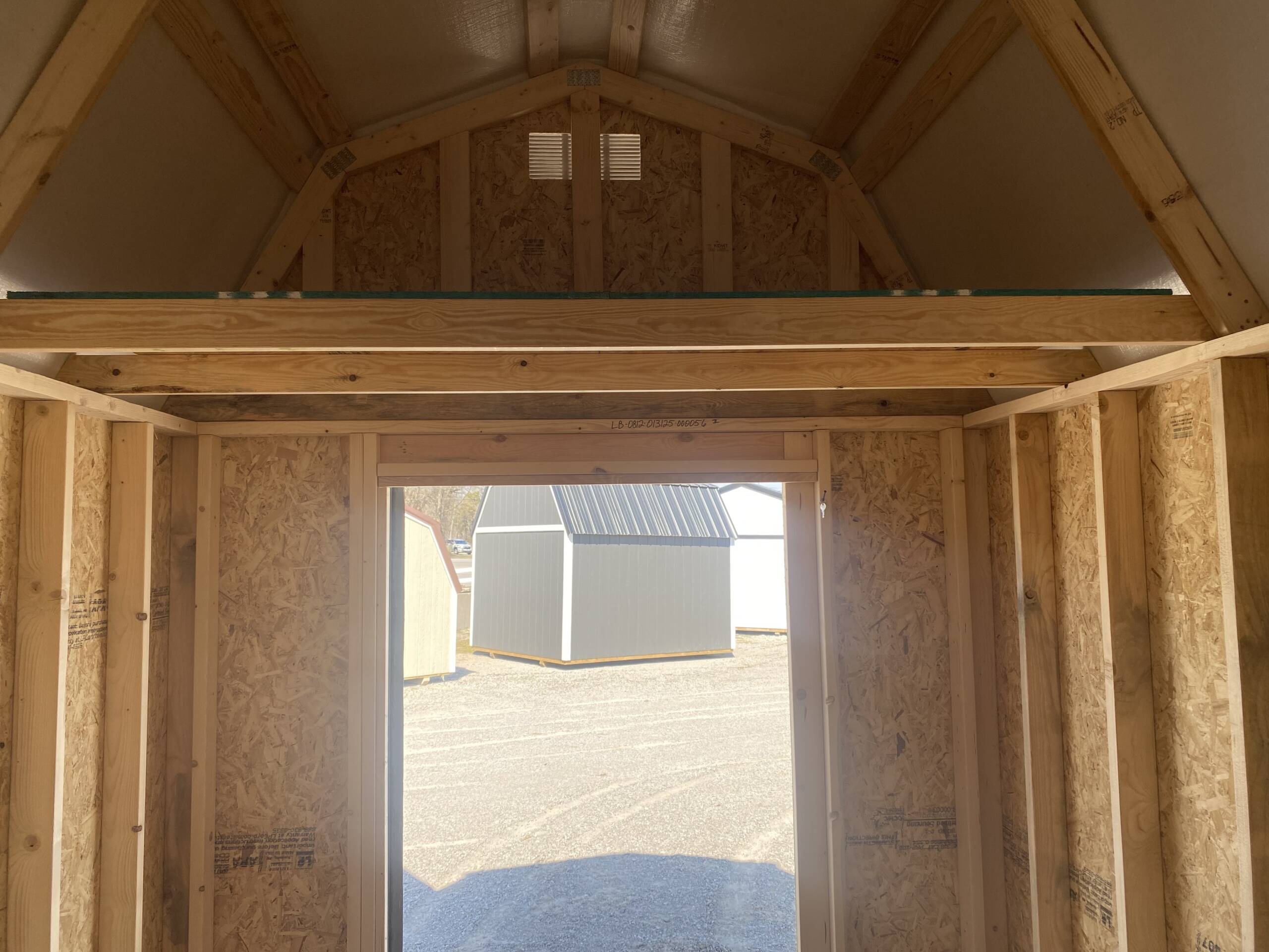 16'' OC FLOOR JOISTS
6'7'' SIDEWALL HEIGHT
6' DOUBLE SHED DOORS (4' SHED DOOR ON 8' WIDE)
FULL LENGTH LOFT SPACE WITH 4' CENTER OPENING - Image 3