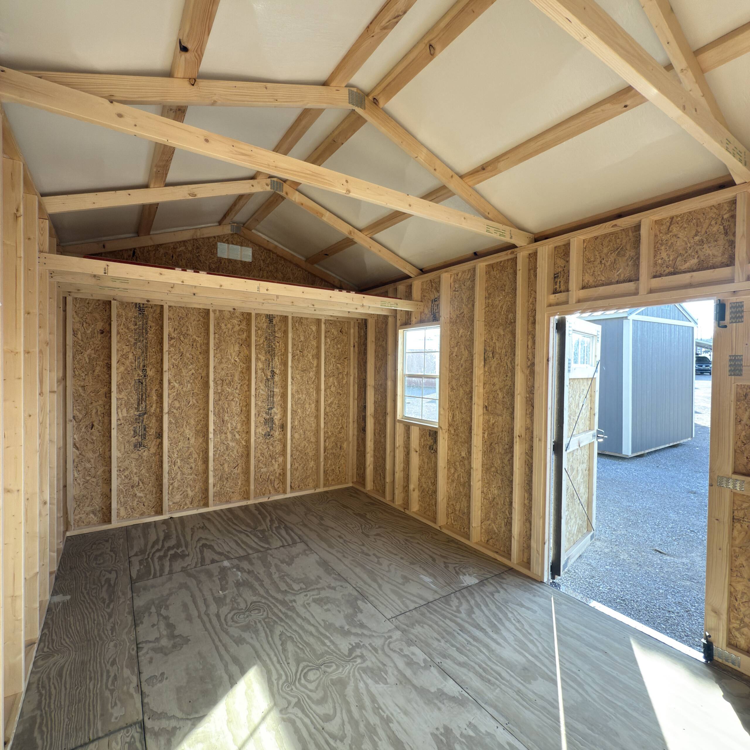 16'' OC FLOOR JOISTS
7'9'' SIDEWALL HEIGHT
6' DOUBLE SHED DOORS W/ TRANSOM WINDOWS
1-2X3 SINGLE PANE WINDOW
4' LOFT AREA - Image 4